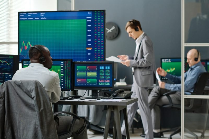stock-traders-working-in-office stock-traders-working-in-office